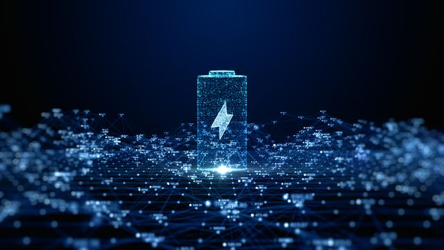 Digital illustration of a glowing battery icon with a lightning bolt symbol, surrounded by a network of interconnected data points against a dark blue background. 